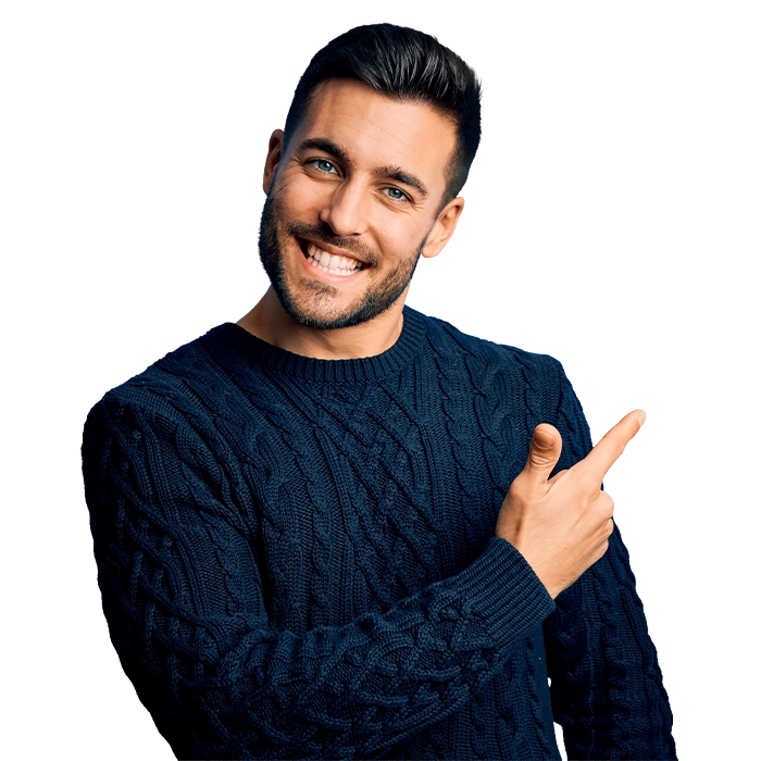 Orthodontist Monsey NY Man In Sweater Smiling HP Man In Sweater Smiling And Pointing Up And Right