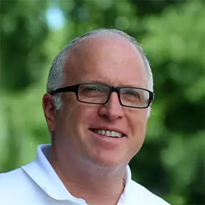 Orthodontist Monsey NY David Schneeweiss About Orthodontist David Schneeweiss Smiling In Front Of Blurred Nature Background